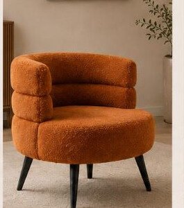 Rust orange boucle fabric accent chair with black legs