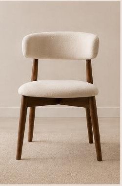 Modern dining chair with cream upholstery and walnut wood legs